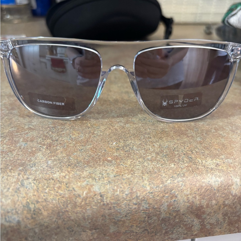 Spyder Transparent Frame Sunglasses with Dark Lenses